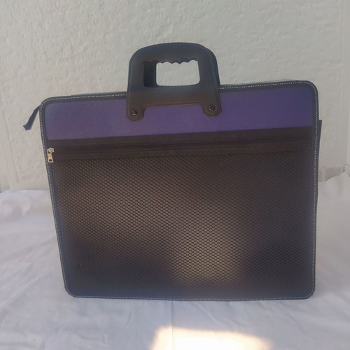Art bag used, black and purple, with non-working zipper