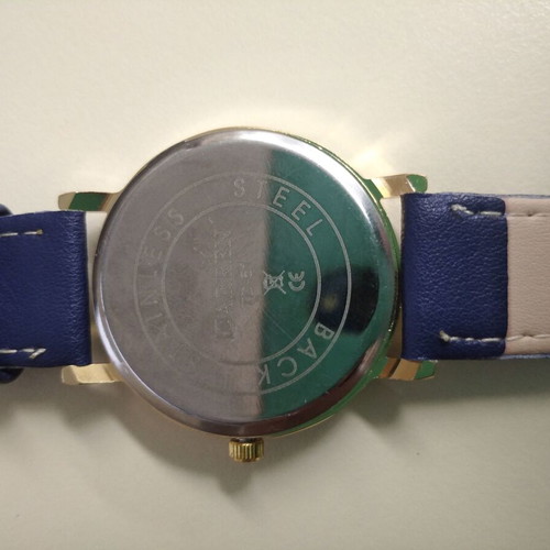 Women's watch new with blue strap and gold details