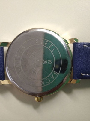 Women's watch new with blue strap and gold details