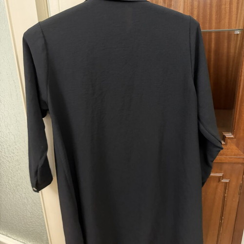 Women's black shirt with leopard print pocket