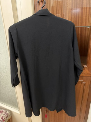 Women's black shirt with leopard print pocket