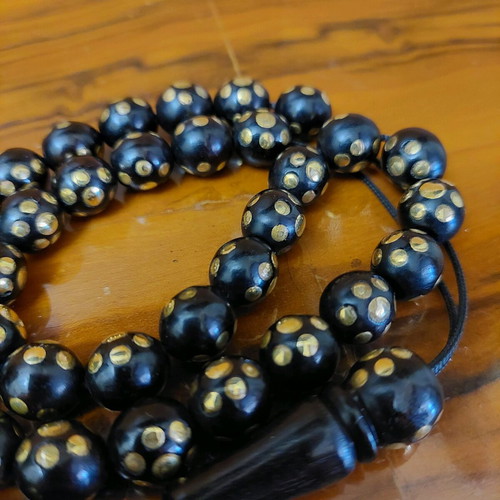 Worry beads with 33 ebony beads and golden copper inlays new