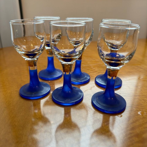 Set of 6 used liqueur glasses with blue base, glass