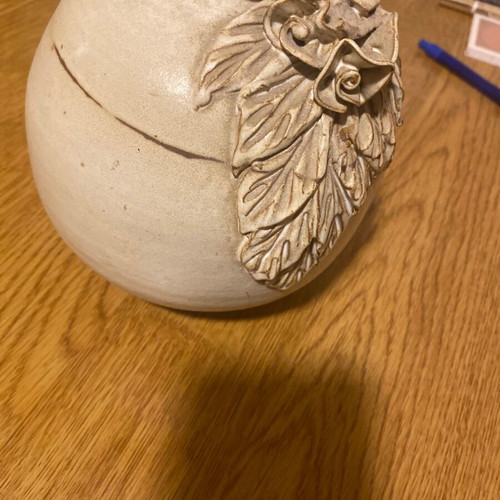 Clay vase with design