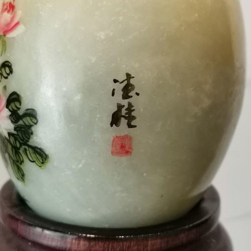 Asian marble egg used with hand-painted design and wooden base