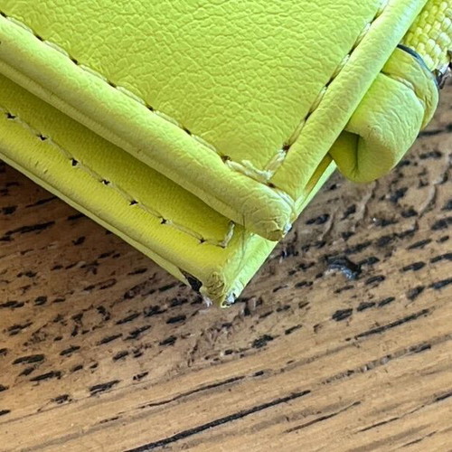 Axel wallet used in bright lime color
