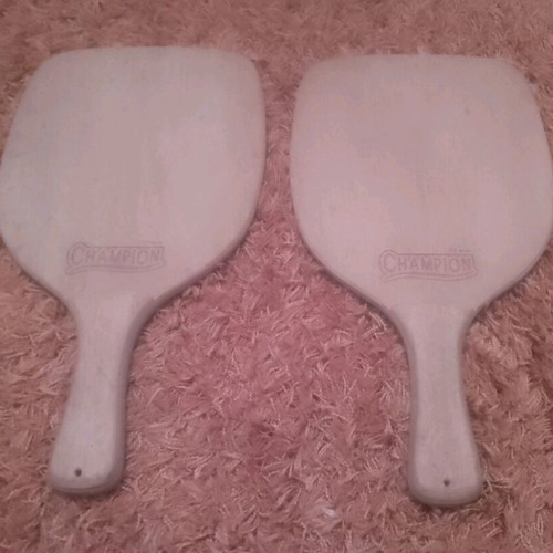 Champion rackets used, set of 2 wooden beach paddles