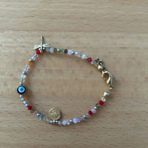 Thin bracelet with colorful stones and charms like new