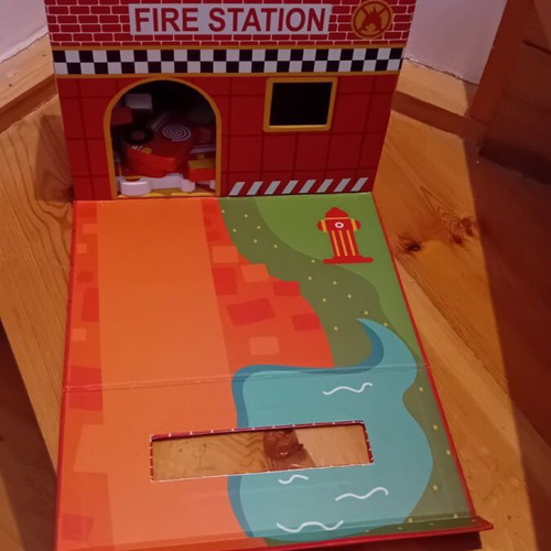 Small Foot fire station suitcase used with 11 wooden toys