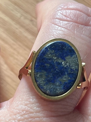 Stainless steel ring like new with blue and gold color