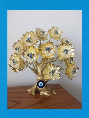 Decorative tree with blue eyes like new, height 27 cm