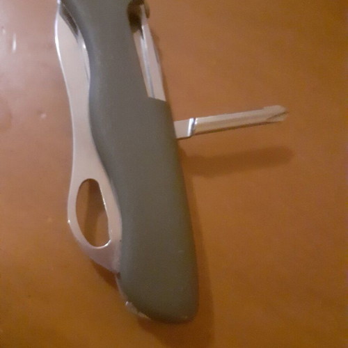 Two multitool pocket knives new with scissors and serrated blade