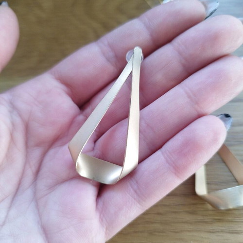 Chrysa dangling earrings like new, gold-colored