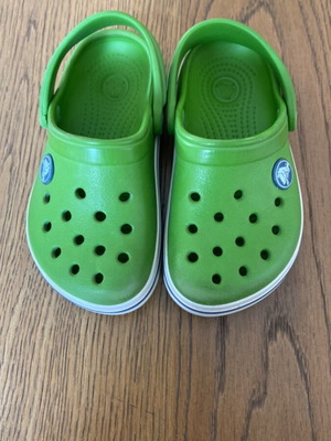 Crocs used, size 8-9c, green sandals