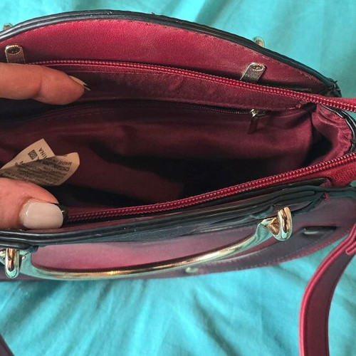 Round red shoulder bag