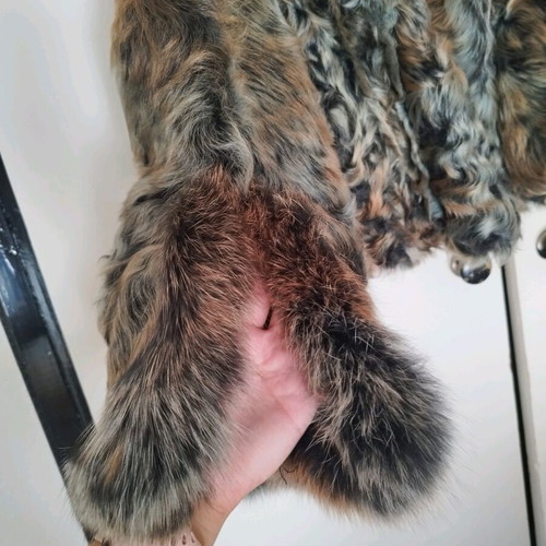 Diversi natural fur size 38 like new