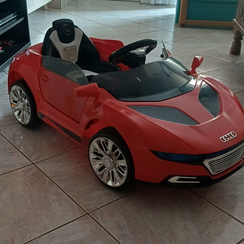 Electric children's car with light, music and remote control
