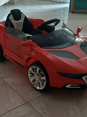 Electric children's car with light, music and remote control