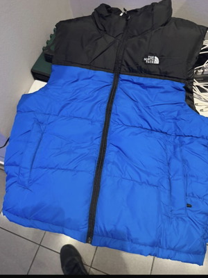 The North Face jacket like new, black and blue