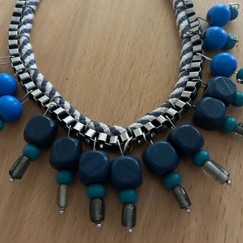 Handmade necklace used with chain, striped cord and wooden beads