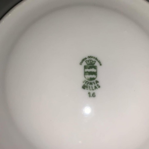 Ionia porcelain cup used with two saucers