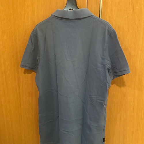 Superdry Polo shirt size XL like new, sea blue with small white defect