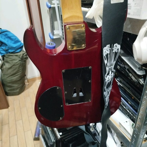 Electric guitar used for repair or decor