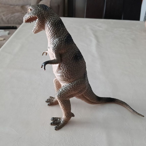 Set of 24 dinosaur figures in various sizes