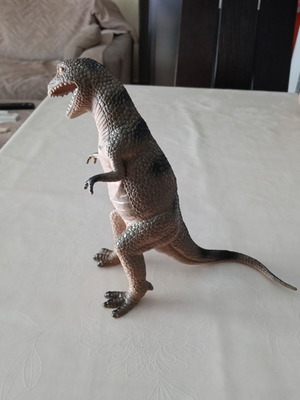 Set of 24 dinosaur figures in various sizes