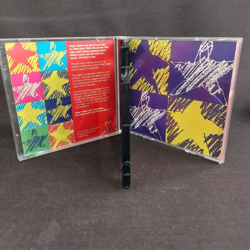 It's Only Rock N Roll CD used, rock
