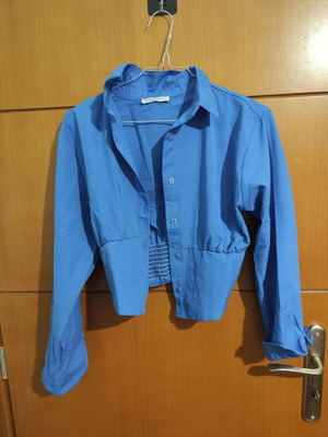 Blouse like new, fitted, blue