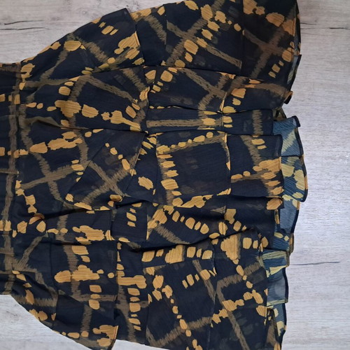 Trilogy skirt used, size S, black and yellow