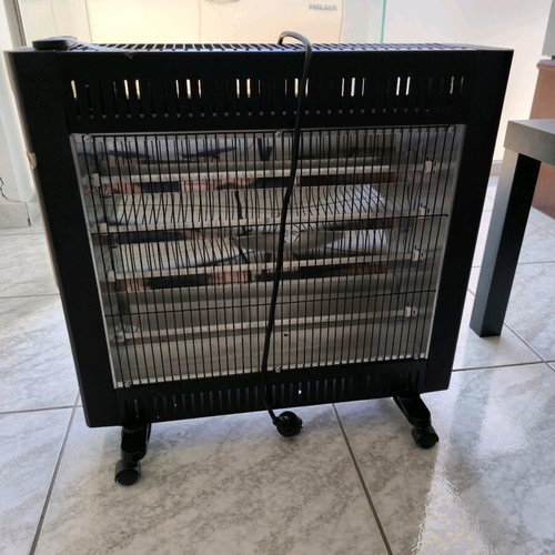 Halogen heater like new with remote control and thermostat