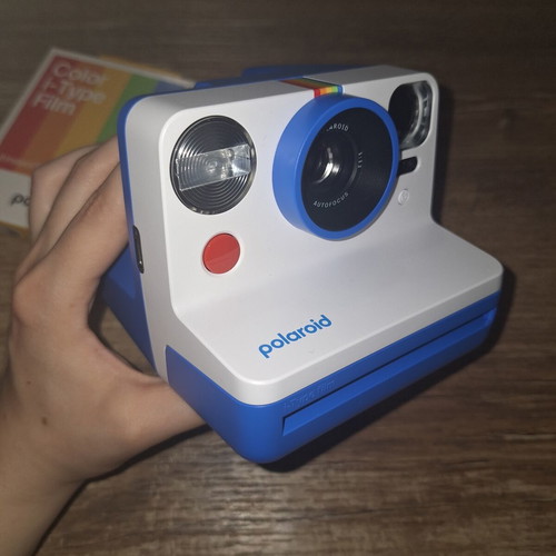 Polaroid camera new with bonus film packs