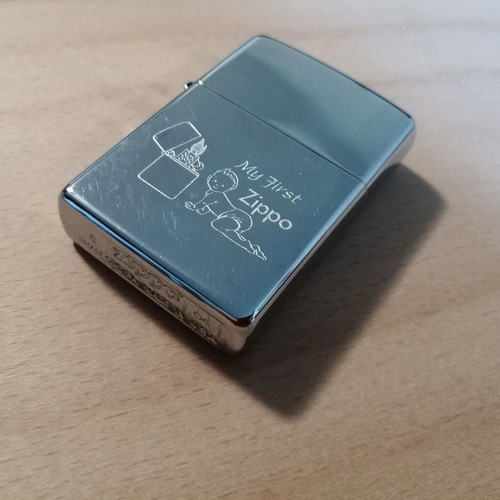 Zippo lighter used with "my first zippo" design
