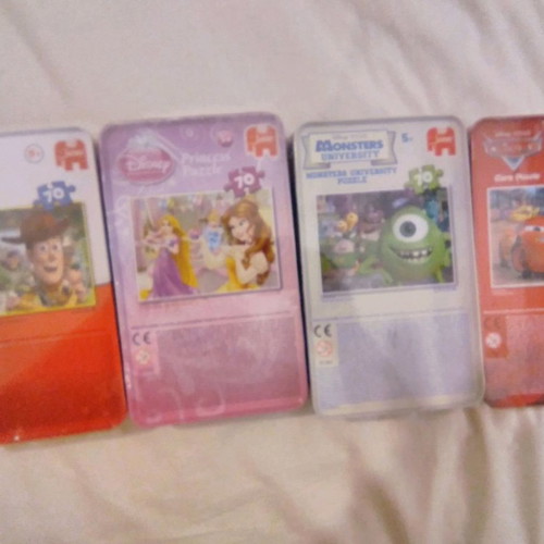 Disney puzzles new, pack of 4 with 70 pieces each