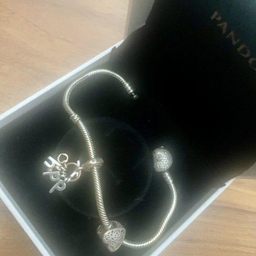 Pandora bracelet with two charms, silver