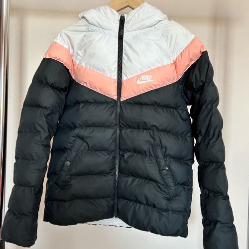 Nike jacket used for girls size Medium with stain on hood