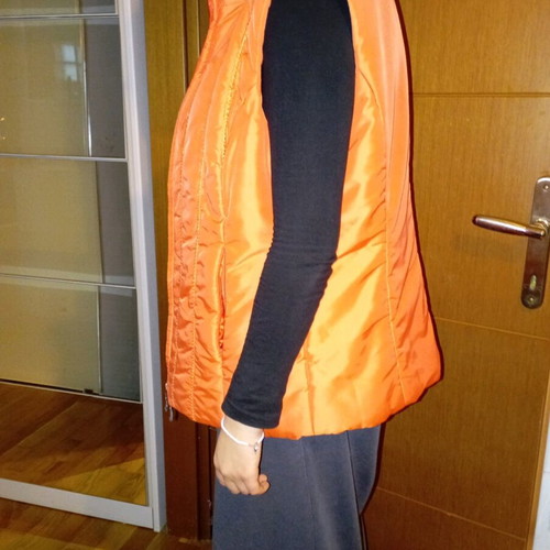 Sleeveless women's jacket like new, size large, orange