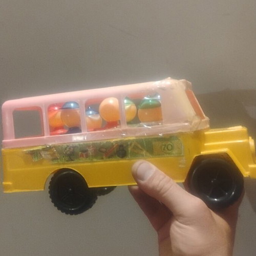 School bus toy used, old with damages