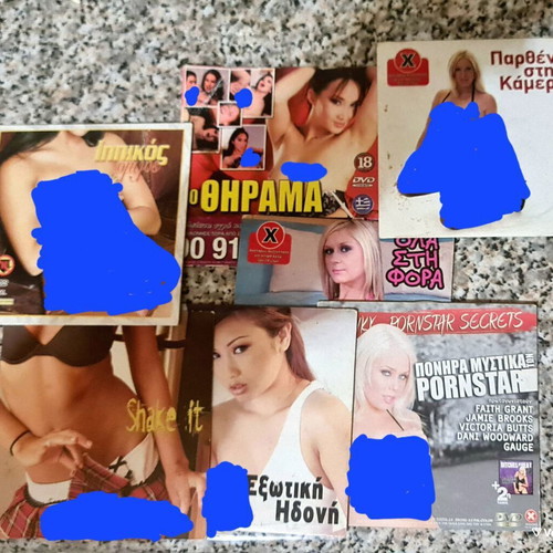 Erotic adult XXX DVDs used, paper cases
