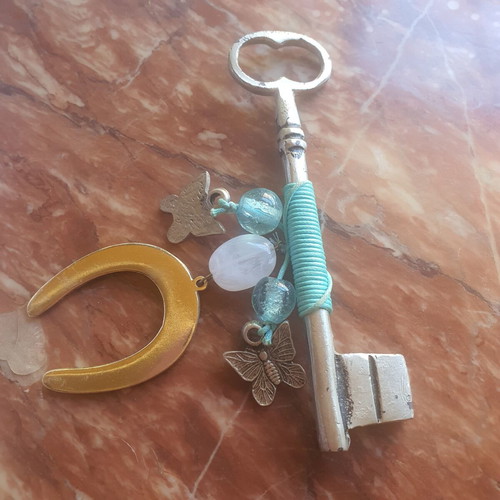 Lucky key charm with horseshoe
