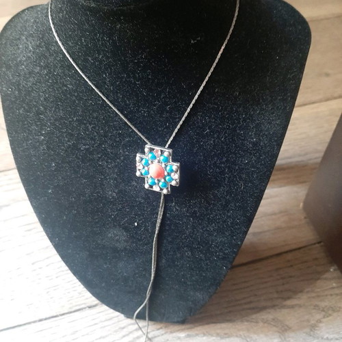Cross necklace with stones used