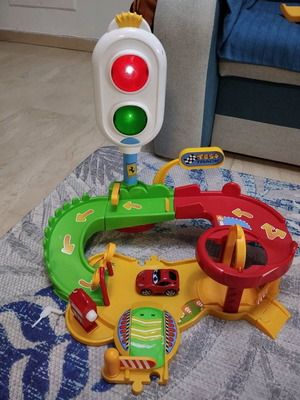 Children's track with car used, sounds and lights working