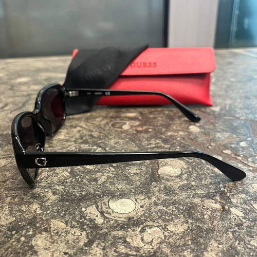 Guess women's sunglasses with red protective case and black cloth