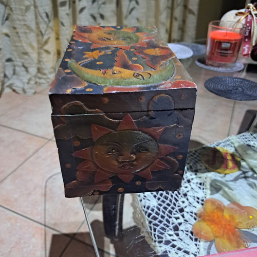 Wooden carved box like new with sun and moon design