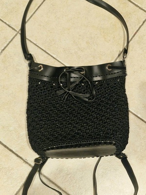 Knitted wool backpack like new, black