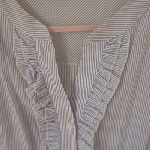 Women's blue striped shirt with ruffles like new, size L