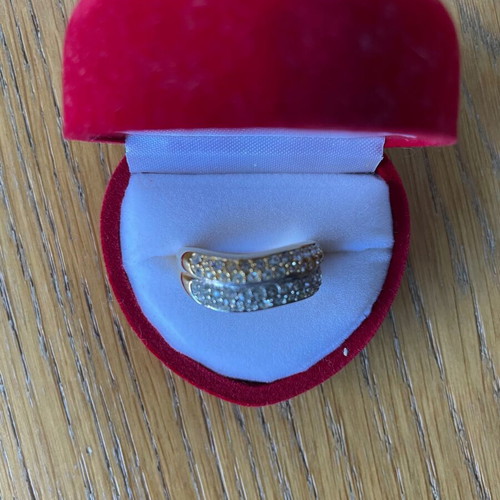 Ring new with two colors gold and silver with zircon unused