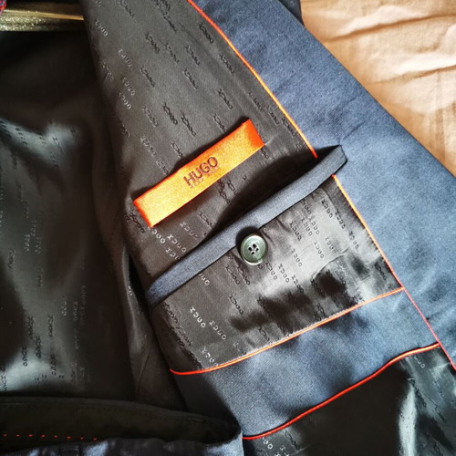 Hugo Boss blue suit with bow tie like new